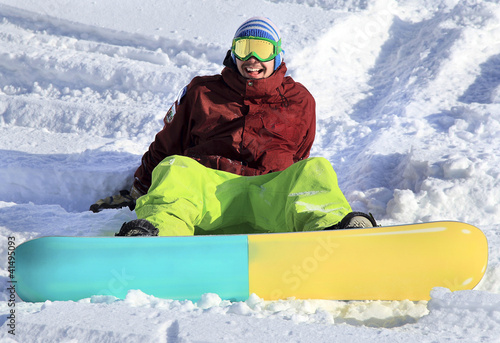 Photo: Happy young snowboarder Happy young snowboarder