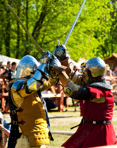 Photo: Medieval knights in battle Medieval knights in battle