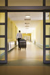 Man entering a hospital Man entering a hospital