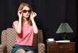 Redhead girl in armchair. 70s Redhead girl in armchair. 70s
