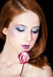 Portrait of beautiful redhead girl with style make-up.