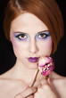 Portrait of beautiful redhead girl with style make-up.