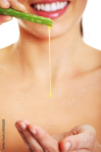 Photo: Woman with aloe vera Woman with aloe vera