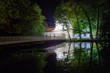 Church on the water at night in Zwierzyniec, Poland.