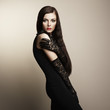 Fashion portrait of young beautiful woman in the black dress Fashion portrait of young beautiful woman in the black dress