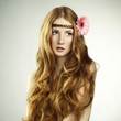Fashion photo of a young woman with red hair