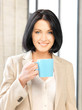 lovely businesswoman with mug