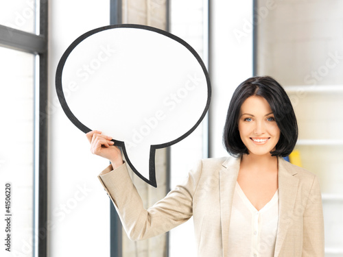 Photo: smiling businesswoman with blank text bubble smiling businesswoman with blank text bubble