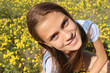 Girl on the nature of a flowered Girl on the nature of a flowered