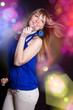 portrait of young beautiful girl singing