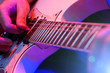 young male musician with a white guitar young male musician with a white guitar