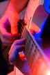 young male musician with a white guitar young male musician with a white guitar