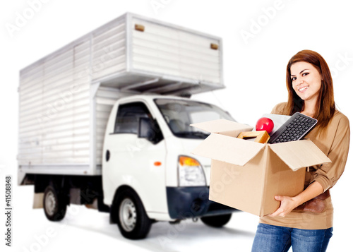 Foto: Woman moving house Woman moving house