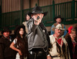 1800's western sheriff with gun drawn at point blank range