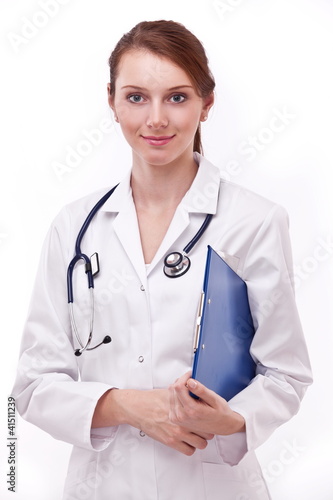 Photo: Portrait of a woman in medical uniform. Isolated on a white. Portrait of a woman in medical uniform. Isolated on a white.