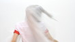 Beautiful young woman combing her hair Beautiful young woman combing her hair