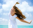Beautiful Girl Having Fun on the Beach