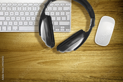 Photo: headphones on keyboard headphones on keyboard