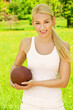 beautiful young sportswoman with rugby ball beautiful young sportswoman with rugby ball