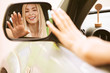 young woman in car