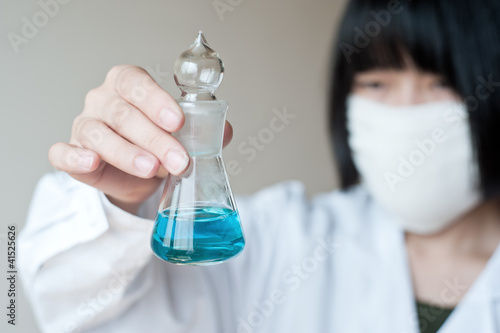 Photo: Female workers doing the experiment Female workers doing the experiment