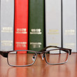 Glasses on the bookshelf