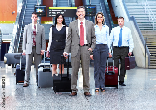 Photo: Group of business people at the airport. Group of business people at the airport.