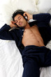 Photo: Nepalese man in pajamas, headphones Nepalese man in pajamas, headphones