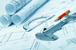 Photo: The plan industrial details, a ruler, caliper, divider and a red The plan industrial details, a ruler, caliper, divider and a red