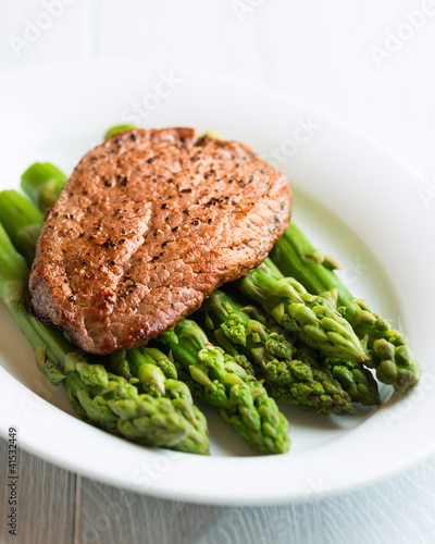 Photo: Beef Steak on Green Asparagus Beef Steak on Green Asparagus