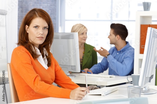 Photo: Portrait of office worker woman Portrait of office worker woman