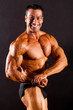 male bodybuilder on black background