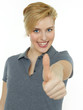 Happy successful woman shows thumb up on white background