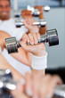 exercise with dumbbell in gym
