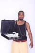 Gangster with a briefcase of cash and a gun.