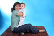 Portrait of a beautiful happy mother with beautiful baby Portrait of a beautiful happy mother with beautiful baby