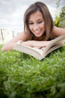 Woman reading outdoors