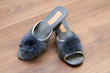 Slippers on the brown parquet floor