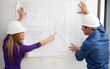 Foto : Architects with blueprints Architects with blueprints