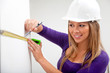 Architect taking measurements