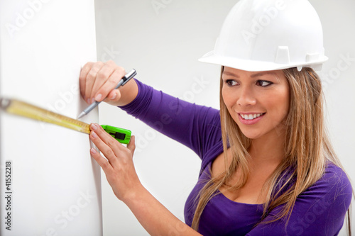 Photo: Architect taking measurements Architect taking measurements