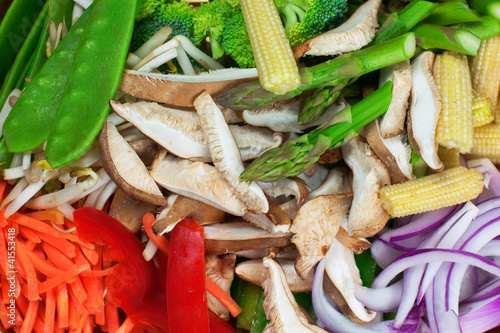 Photo: Fresh stir fry vegetables. Healthy food ingredients. Fresh stir fry vegetables. Healthy food ingredients.
