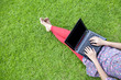 Female using laptop outdoor