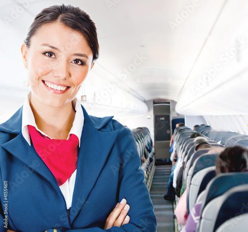 Photo: Flight attendant in an airplane Flight attendant in an airplane