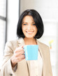 lovely businesswoman with mug