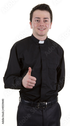 Photo: Priest with a thumbs up sign Priest with a thumbs up sign