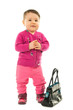Baby girl with hand bag over white Baby girl with hand bag over white