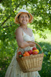 woman with basket of vegetables woman with basket of vegetables