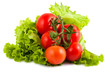 Branch of tomatoes on salad leaf
