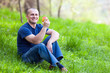 Man eating an apple outdoor Man eating an apple outdoor